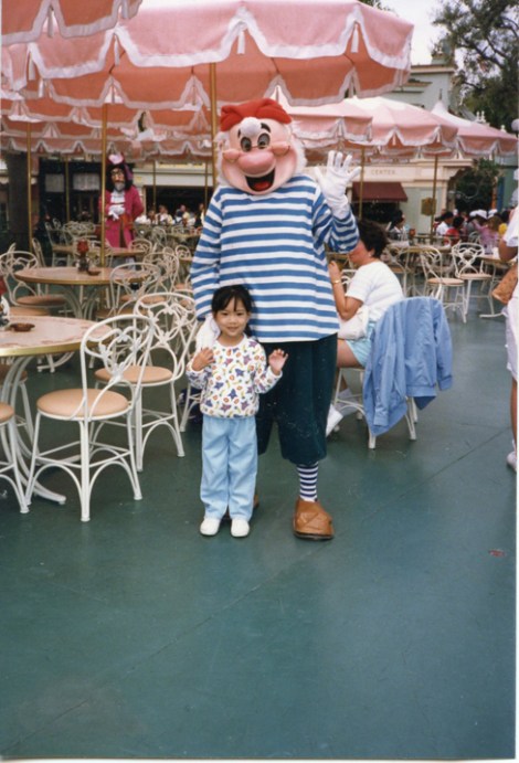 Santos as a child at Disneyland